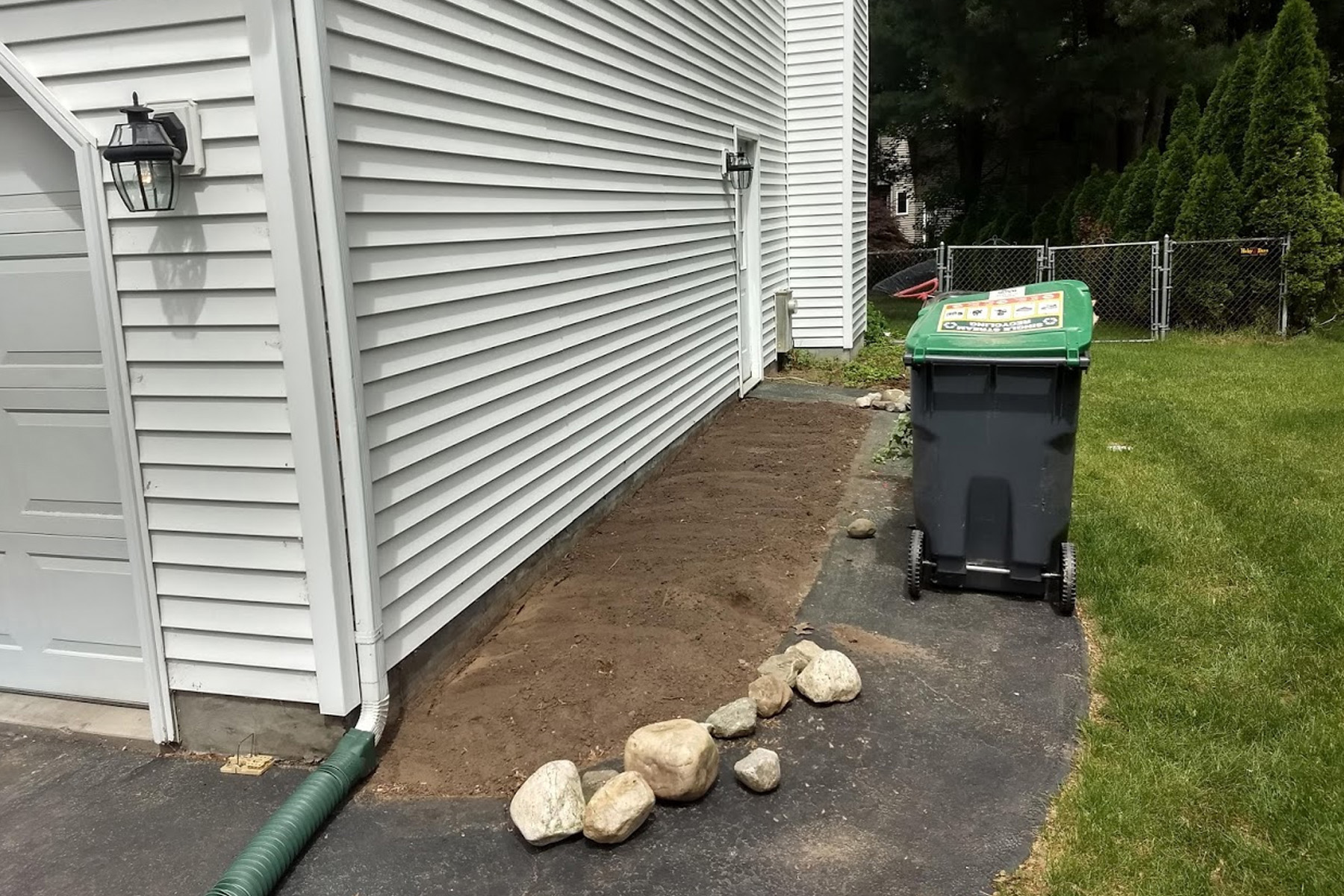 Thumbnail of the original blacktop path along the side of the garage