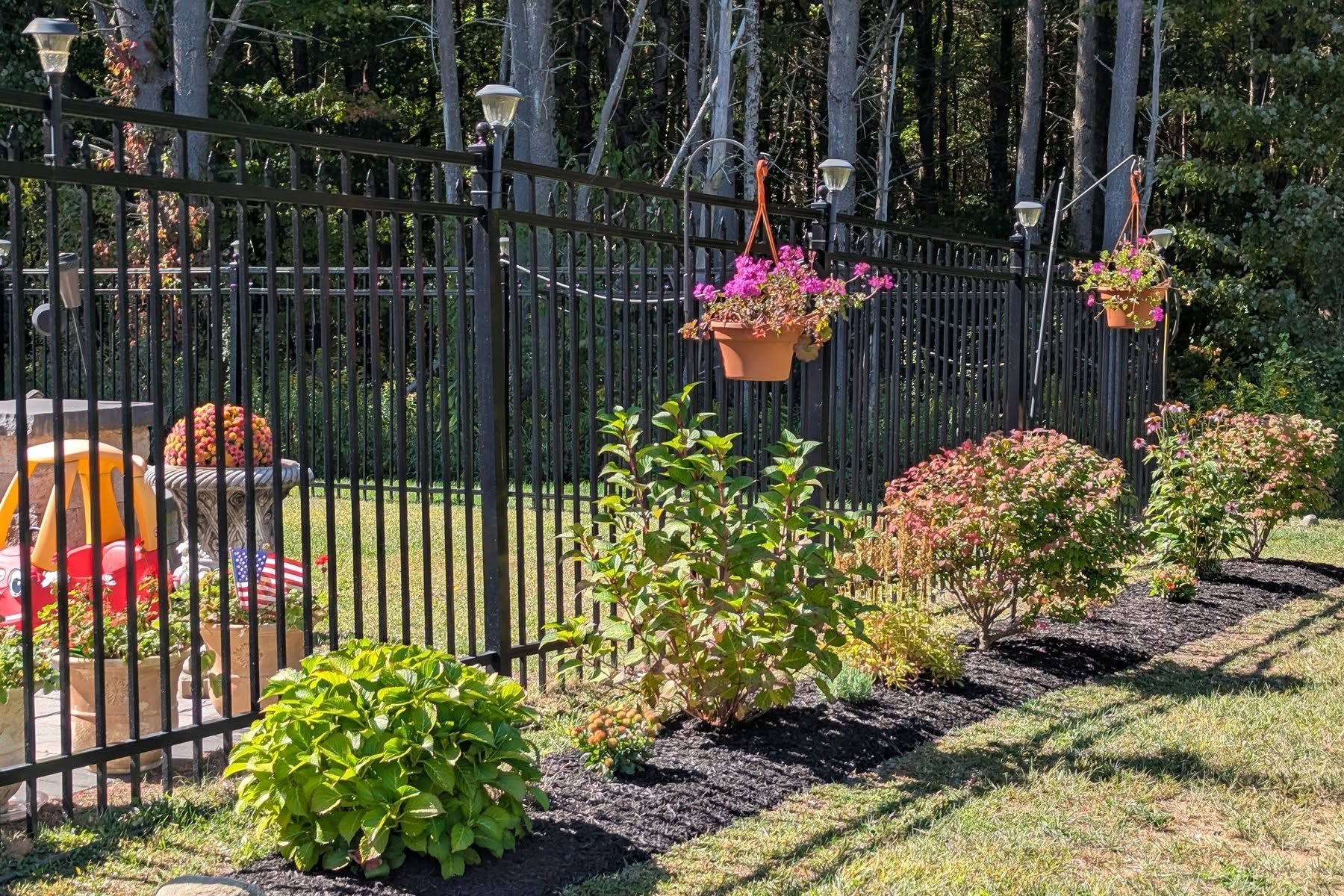 Thumbnail of Joe trimming a bush